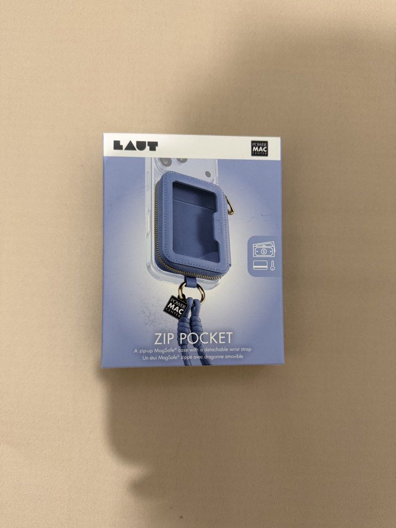 LAUT Zip Pocket MagSafe Case with Wrist Strap (Category: Cases & Sleeves) located in Quezon City. Submitted by abmdv (Listing ID 1470352203, Image 1). Description: - Color: Blue - Compatibility: MagSafe iPhones - Storage: Securely holds cards, cash, and keys on the back of your phone - Extras: Includes a detachable wrist strap with an authentic Power Mac Center tag - Condition: Brand new in original packaging - Ideal for: Going out light and keep