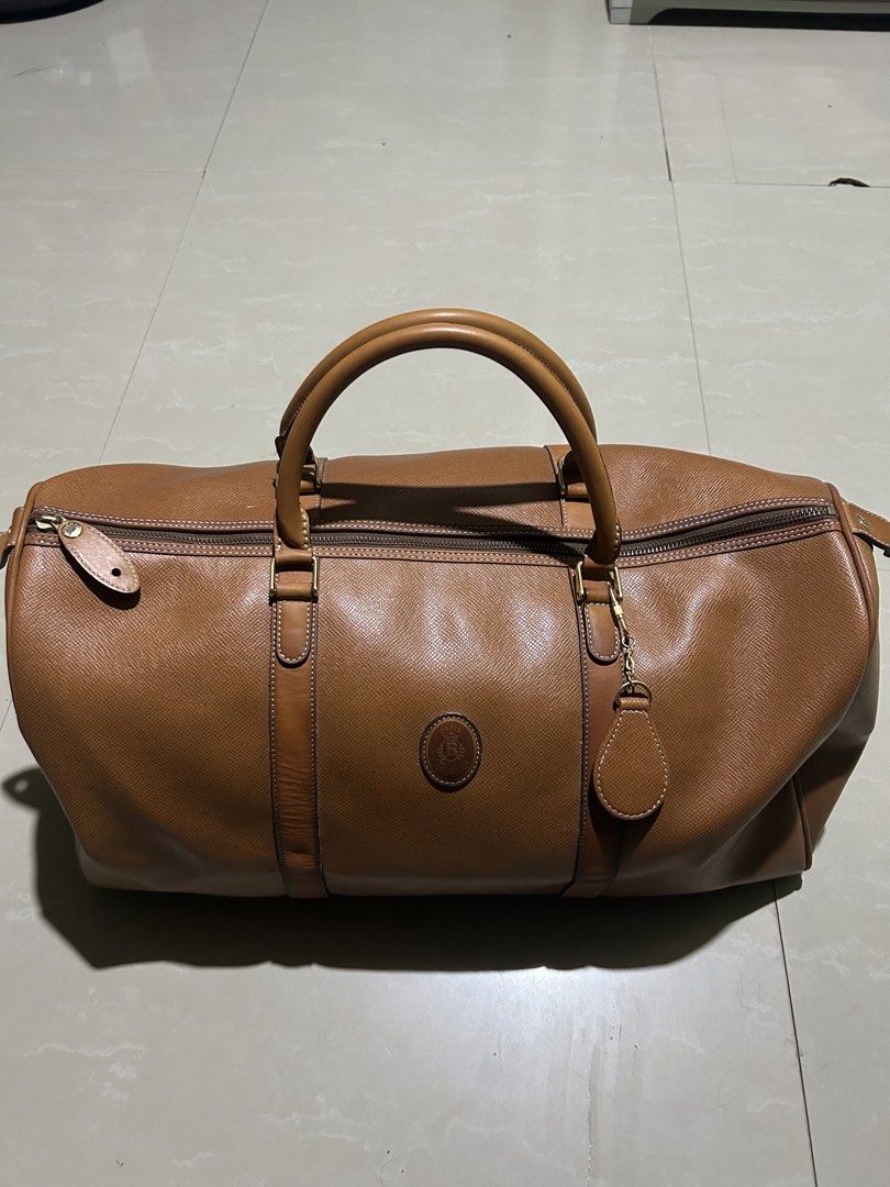 LEATHER DUFFLE BAG (Category: Belt bags, Clutches and Pouches) located in Manila. Submitted by findswearv2_ (Listing ID 1470390831, Image 2). Description: DM TI OTHER DETAILS 📍Cavite .