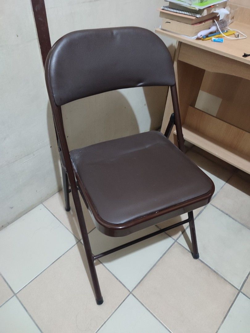 Leather Office Folding Chair (Category: Chairs) located in Paranaque City. Submitted by breealigam24841 (Listing ID 1470446411, Image 2). Description: Color: Coffee brown (leather seat, backrest, and matching frame) Condition: Lightly used and sturdy; No issues Use: Compact size, ideal for extra seating at home or in the office *Bought this around February this year (2026) for Php 410.00 Reason for Selling: Will be moving out of my apartment. Hin