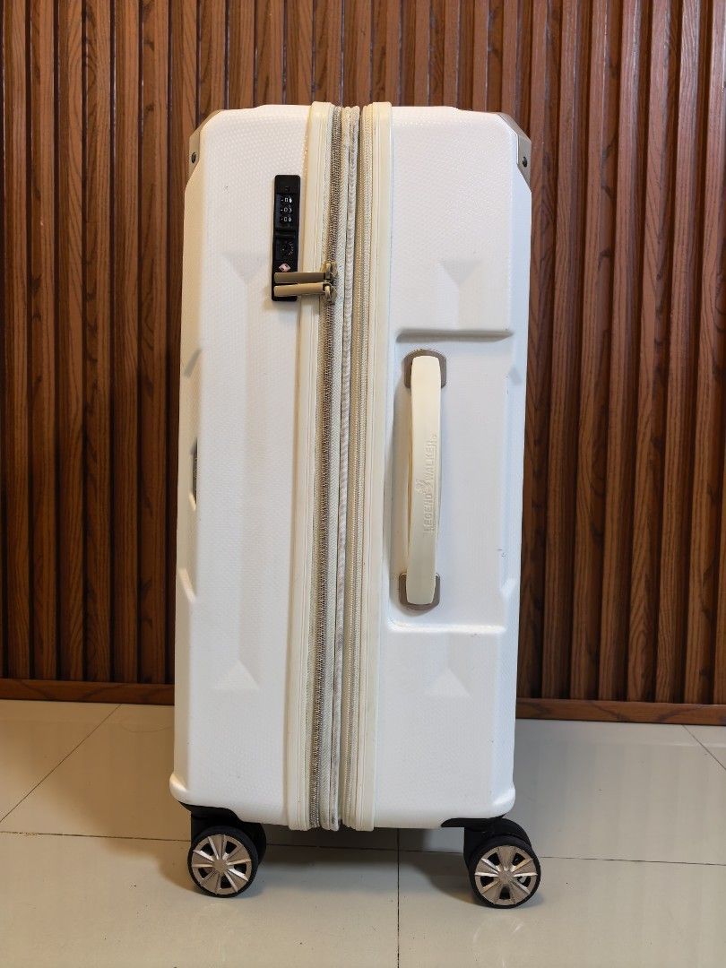 Legend Walker Luggage (Category: Luggage) located in Manila. Submitted by uno001 (Listing ID 1470477115, Image 3). Description: Brand: Legend Walker ✅ Original 💯 ✅ Large Check luggage ✅ H26" xW16" x D11.5-13 Inches ✅ Made from Polypropylene plastic ✅ Heavy Duty Guaranteed ✅ 360° Wheels all smooth ✅ With Expandable zipper ✅ TSA002 Lock with Passcode ⬆️ With Sign of usage scratch only..