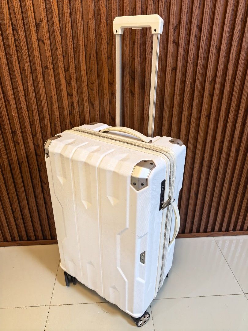 Legend Walker Luggage (Category: Luggage) located in Manila. Submitted by uno001 (Listing ID 1470477115, Image 2). Description: Brand: Legend Walker ✅ Original 💯 ✅ Large Check luggage ✅ H26" xW16" x D11.5-13 Inches ✅ Made from Polypropylene plastic ✅ Heavy Duty Guaranteed ✅ 360° Wheels all smooth ✅ With Expandable zipper ✅ TSA002 Lock with Passcode ⬆️ With Sign of usage scratch only..
