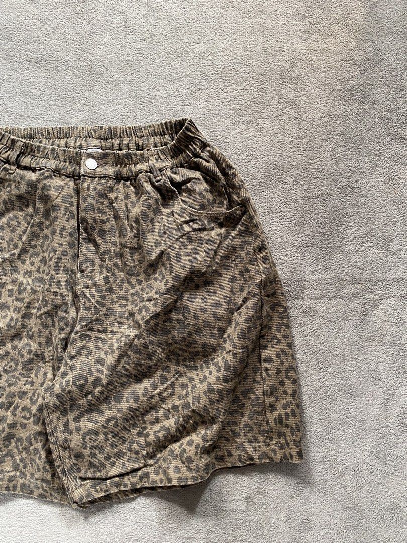 Leopard Jorts (Category: Shorts) located in Ozamiz City. Submitted by thriftnikael (Listing ID 1470515952, Image 2). Description: waist: 26-36 length: 21 thigh: 16 hem: 15 Color rate: 10/10 Condition: 10/10 Issue: na .