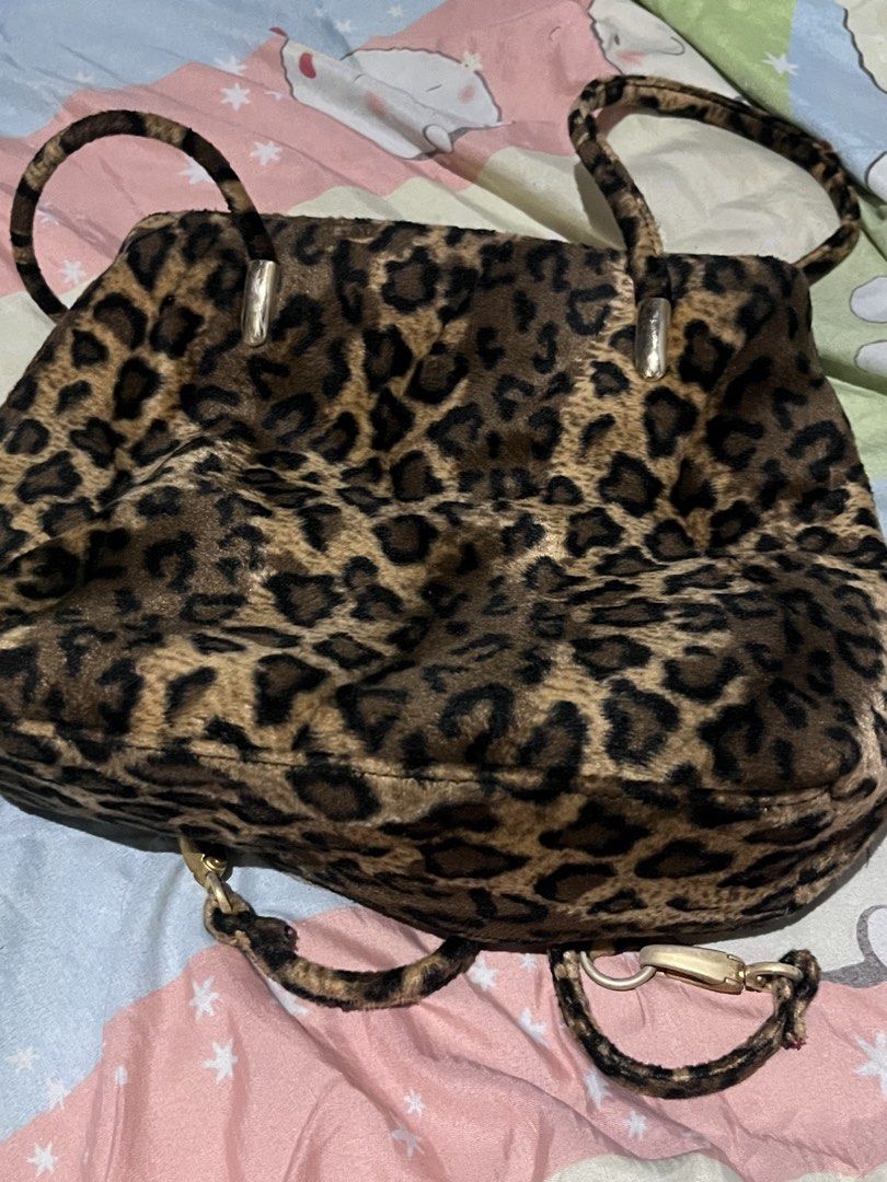 Leopard print faux fur backpack with straps (Category: Shoulder Bags) located in Manila. Submitted by noctischarms (Listing ID 1470494286, Image 2). Description: leopard print faux fur shoulder bag/backpack multiple straps what u see is what u get rfs: decluttering.