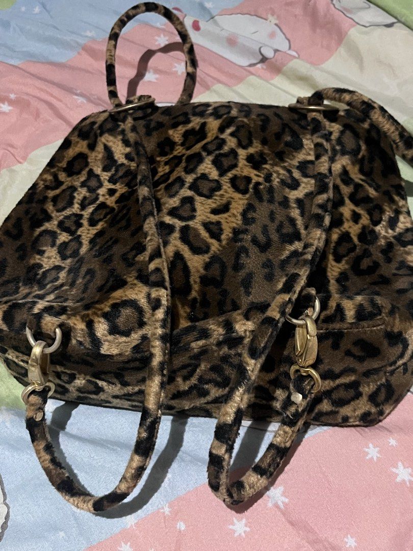 Leopard print faux fur backpack with straps (Category: Shoulder Bags) located in Manila. Submitted by noctischarms (Listing ID 1470494286, Image 1). Description: leopard print faux fur shoulder bag/backpack multiple straps what u see is what u get rfs: decluttering.