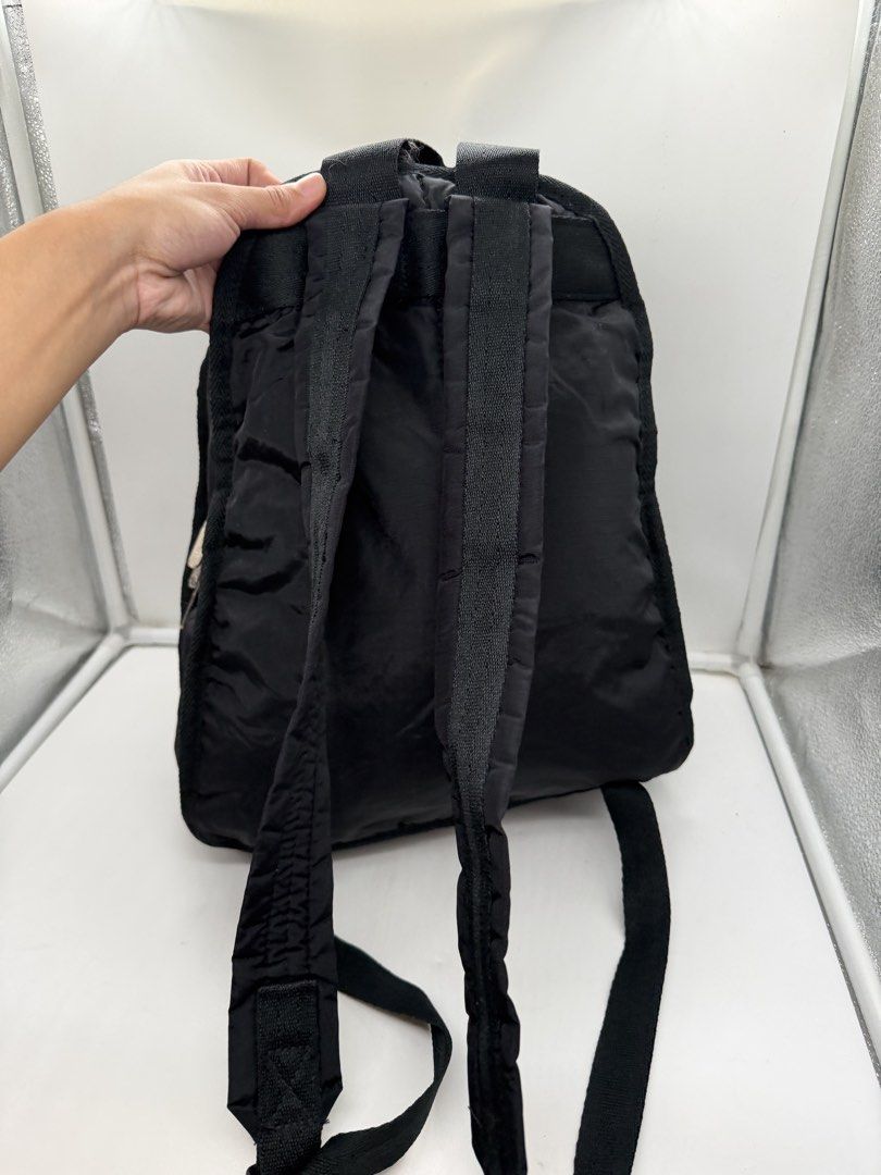 LeSportsac Black Unisex Classic Basic lightweight nylon Backpack (Category: Backpacks) located in Cavite. Submitted by aellavier (Listing ID 1470360122, Image 3). Description: orig preloved auth. minila sigjs of use needs laba if maselan. preloved no tears .