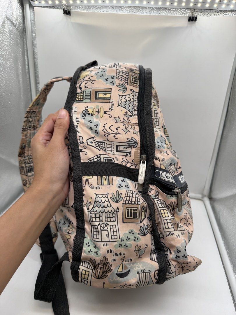 LeSportsac lightweight nylon printed beige pink backpack (Category: Backpacks) located in Cavite. Submitted by aellavier (Listing ID 1470357815, Image 3). Description: orig preloved auth. no tears, needs cleaning/ laba .