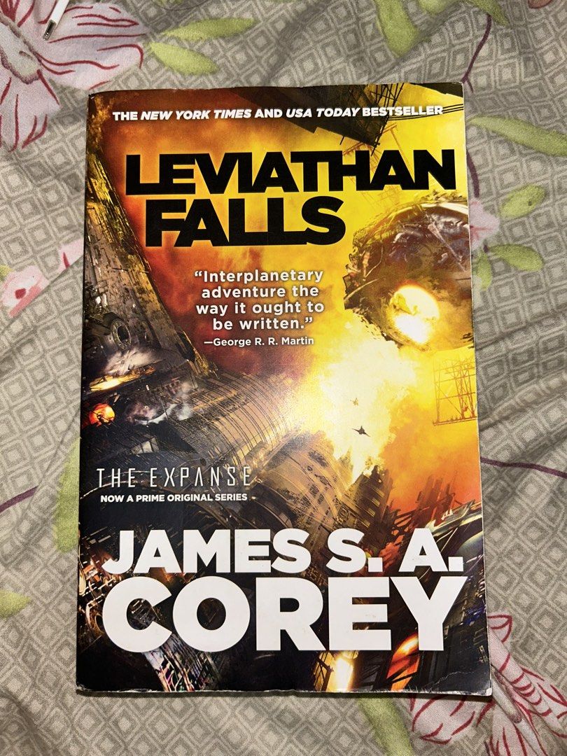Leviathan Falls by James S. A. Corey (The Expanse #9) (Category: Storybooks) located in Bulacan. Submitted by ady.ap (Listing ID 1470444232, Image 2). Description: - Title/Series: Book 9 of The Expanse series (Final Book) - Author: James S. A. Corey - Format: Large Paperback - Condition: One black dot as remaindered mark at the bottom side (see photos), creases & dirt marks at the side, light crease at the spine.