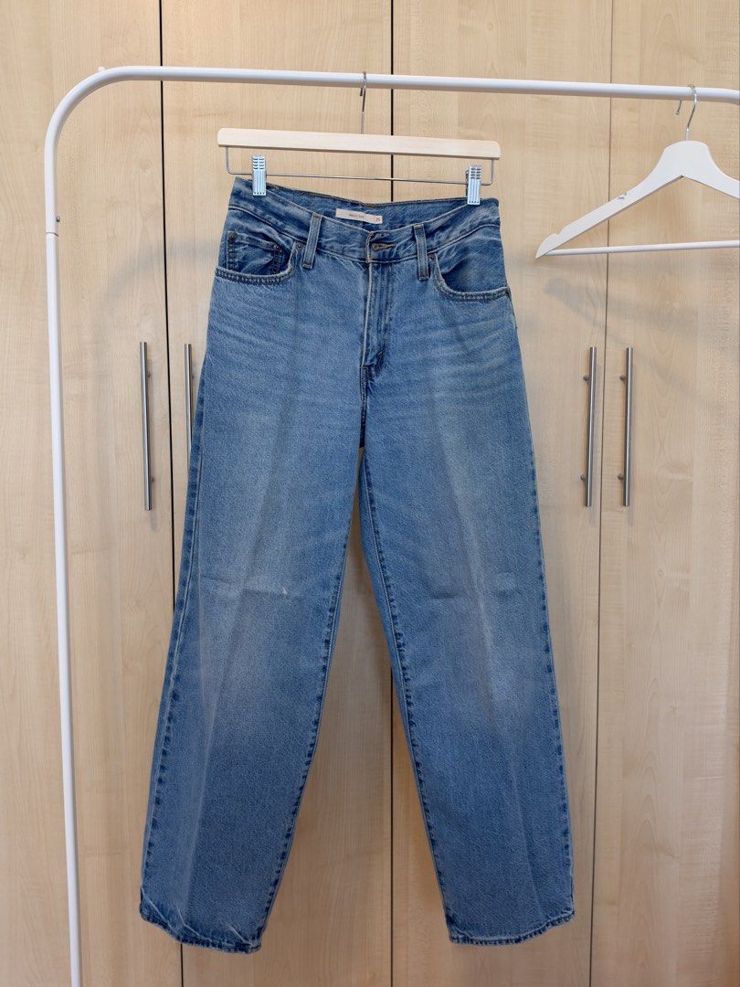 Levi's Baggy Dad Jeans Size 25 (Category: Jeans) located in Makati City. Submitted by itsmeann09 (Listing ID 1470392361, Image 1). Description: - Brand: Levi's - Style: Baggy Dad Jeans - Color: Classic Light Blue Wash - Size: 25 - Fit: High-waisted with relaxed, wide legs - Details: Five-pocket styling, zip fly, button closure, leather back patch, and red tab - Condition: Great casual staple for everyday wear Like new used only once.