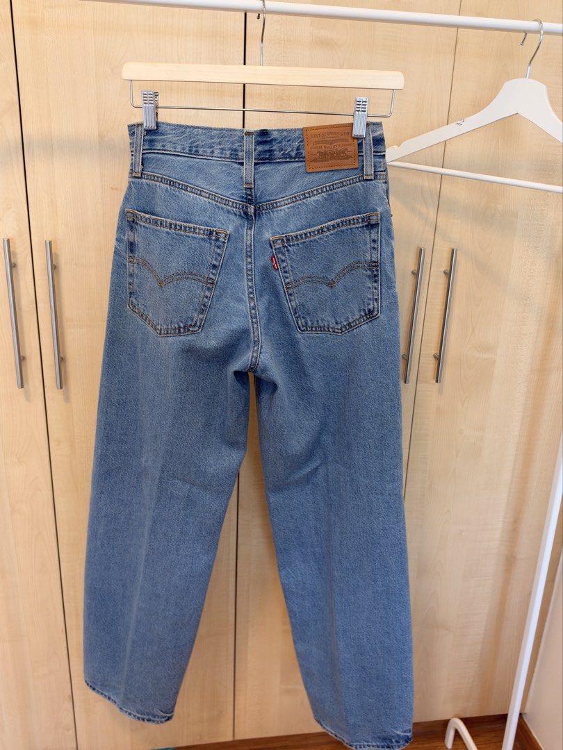 Levi's Baggy Dad Jeans Size 25 (Category: Jeans) located in Makati City. Submitted by itsmeann09 (Listing ID 1470392361, Image 3). Description: - Brand: Levi's - Style: Baggy Dad Jeans - Color: Classic Light Blue Wash - Size: 25 - Fit: High-waisted with relaxed, wide legs - Details: Five-pocket styling, zip fly, button closure, leather back patch, and red tab - Condition: Great casual staple for everyday wear Like new used only once.