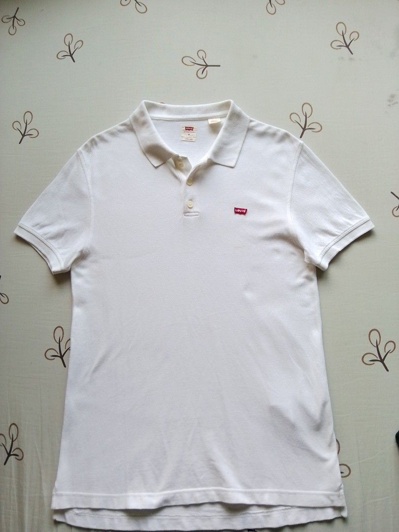 Levis Polo Shirt (Category: Tshirts & Polo Shirts ) located in Mabalacat. Submitted by zero2mthrift (Listing ID 1470425289, Image 2). Description: Excellent condition Size Meduim on Tag/fittings No issue 21 width 28length Complete tags and details. Authentic. Location: Pampanga.