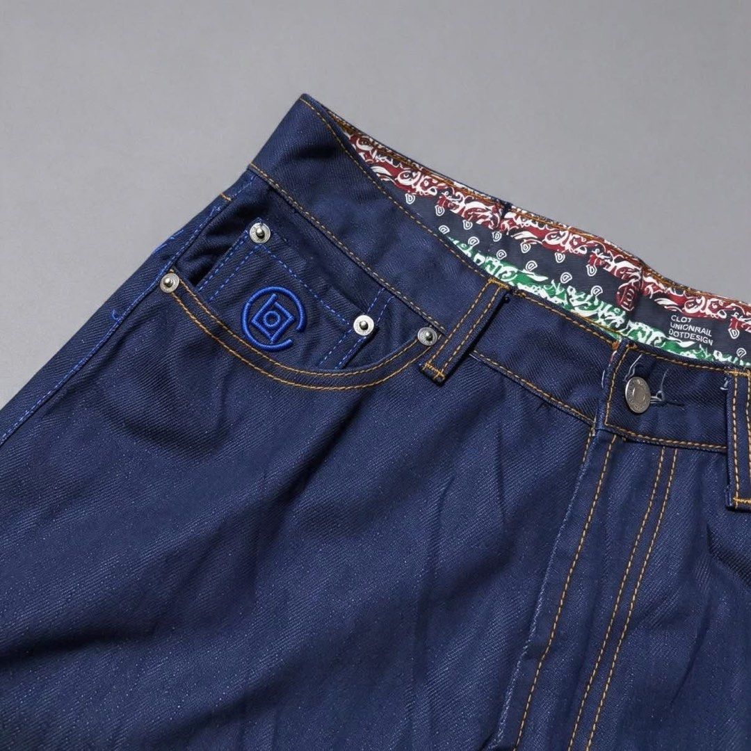 Levi's x Clot Denim Jeans (Category: Jeans) located in Manila. Submitted by galay.15 (Listing ID 1470466515, Image 3). Description: Levis X Clot - SIZE:32- Brand/Fit: Levi's straight leg denim - Wash/Color: Dark wash with striking blue contrast stitching - Special Details: Signature Clot embroidery on the back and coin pocket - Interior: Stylish paisley print lining inside the waistband - Hardware: Levi's branded metal button closure and durable 