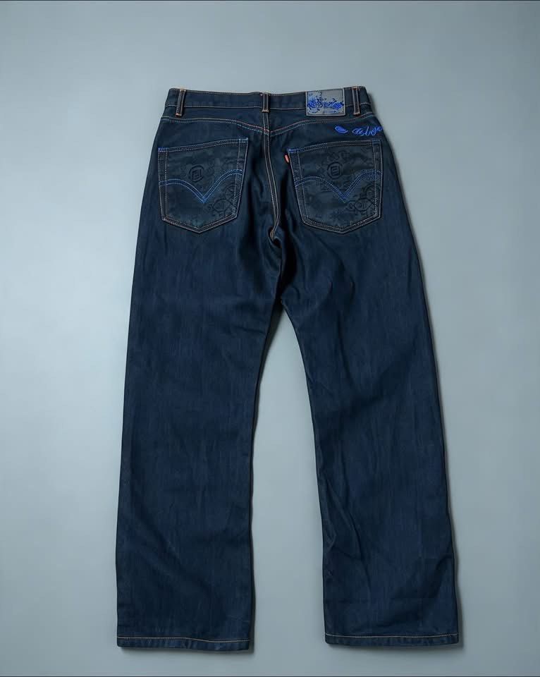 Levi's x Clot Denim Jeans (Category: Jeans) located in Manila. Submitted by galay.15 (Listing ID 1470466515, Image 2). Description: Levis X Clot - SIZE:32- Brand/Fit: Levi's straight leg denim - Wash/Color: Dark wash with striking blue contrast stitching - Special Details: Signature Clot embroidery on the back and coin pocket - Interior: Stylish paisley print lining inside the waistband - Hardware: Levi's branded metal button closure and durable 