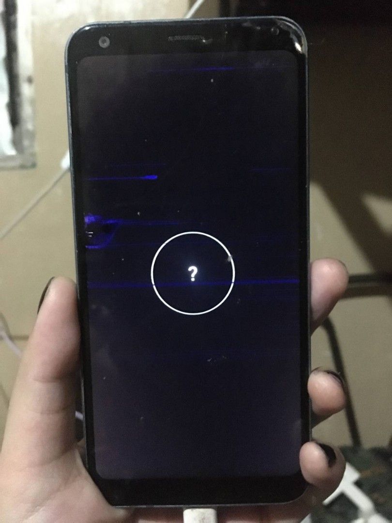 LG Q7+ phone (Category: Early Generation Mobile Phones) located in Quezon City. Submitted by livkatecooke (Listing ID 1470465269, Image 3). Description: - Brand/Model: LG Q7+ phone - Condition: Pre-loved, heavy scratches and cracks on the screen, displays question mark icon when powered/plugged - Intended Use: Ideal for spare parts, repair, or tech hobbyist project - Shipping/Mailing: Available, Lalamove buyer will shoulder shipping fee .