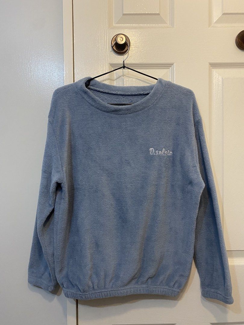 Light blue embroidered fleece sweatshirt (Category: Coats, Jackets and Outerwear) located in Binan City. Submitted by jjazrylle (Listing ID 1470544688, Image 2). Description: color: light blue material: fuzzy fleece size: s to l condi: 9/10 (once used!).