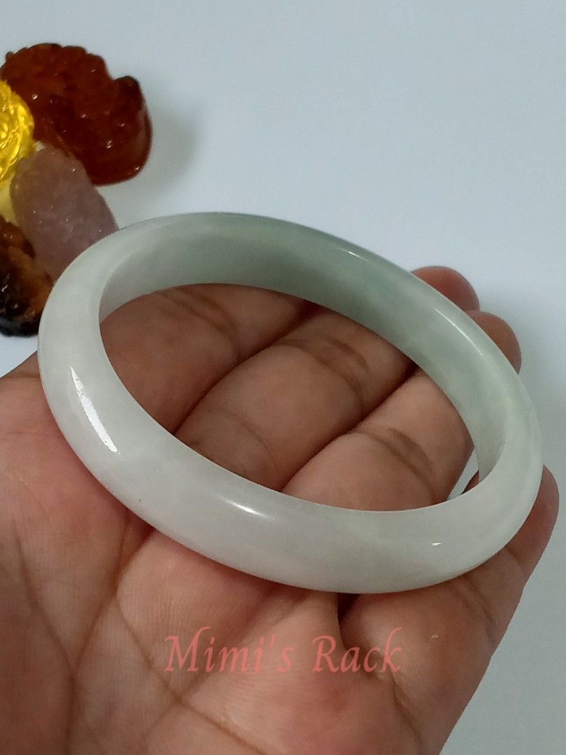 Light Green Jadeite Hard Bangle Bracelet 55mm (Category: Bracelets) located in Taguig. Submitted by mimisrack (Listing ID 1470547334, Image 1). Description: 💚🍀 Good Luck & Fortune — jadeite is traditionally cherished as a symbol of blessings and auspicious opportunities. 💰 Wealth & Prosperity — light green symbolizes abundance, financial growth, and flourishing opportunities. 🛡️ Protection & Safety — jade bangles are traditionally worn as sym