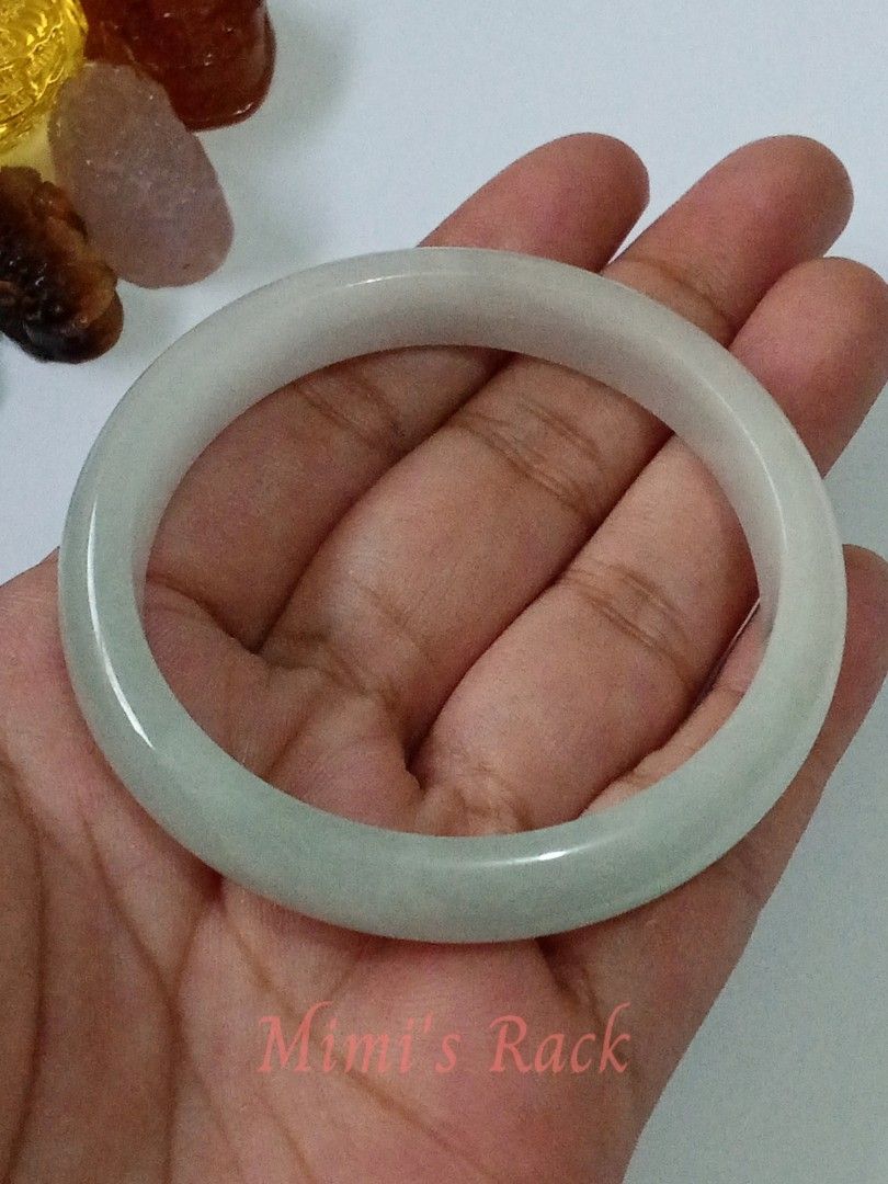 Light Green Jadeite Hard Bangle Bracelet 55mm (Category: Bracelets) located in Taguig. Submitted by mimisrack (Listing ID 1470547334, Image 3). Description: 💚🍀 Good Luck & Fortune — jadeite is traditionally cherished as a symbol of blessings and auspicious opportunities. 💰 Wealth & Prosperity — light green symbolizes abundance, financial growth, and flourishing opportunities. 🛡️ Protection & Safety — jade bangles are traditionally worn as sym
