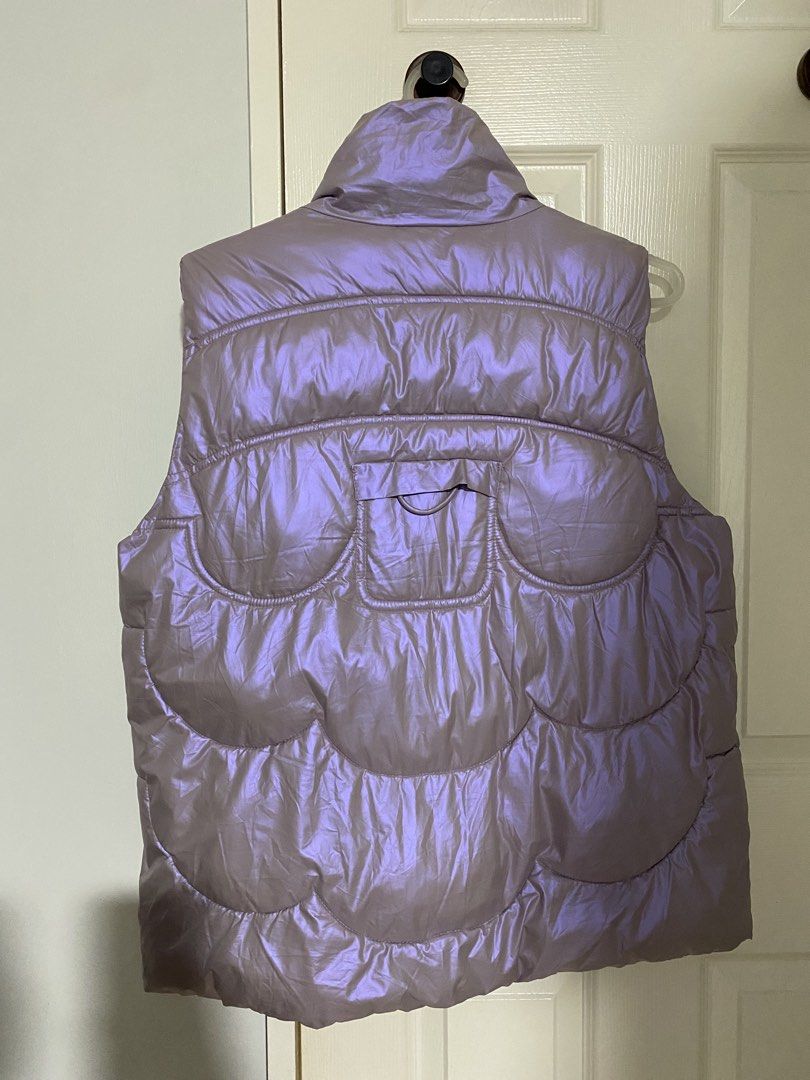 Light Purple Metallic Puffer Vest (Category: Coats, Jackets and Outerwear) located in Binan City. Submitted by jjazrylle (Listing ID 1470549642, Image 3). Description: color: shiny light purple (parang holographic/ metallic) size: 5XL on tag, but can fit m-xl lang condition: 10/10 (once used).