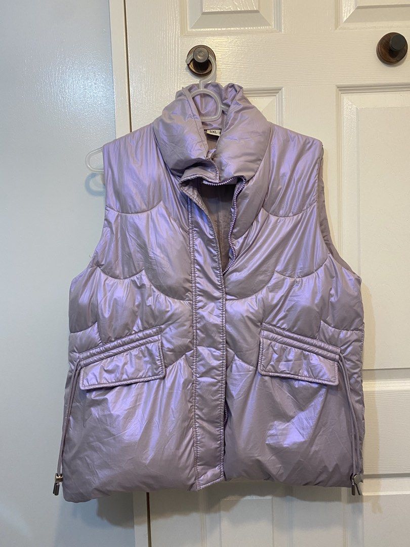 Light Purple Metallic Puffer Vest (Category: Coats, Jackets and Outerwear) located in Binan City. Submitted by jjazrylle (Listing ID 1470549642, Image 2). Description: color: shiny light purple (parang holographic/ metallic) size: 5XL on tag, but can fit m-xl lang condition: 10/10 (once used).
