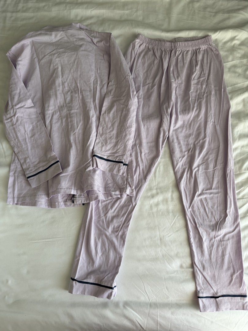 Light purple pajama set with dark piping (Category: Babies & Kids Fashion) located in Pasig City. Submitted by kekzie30 (Listing ID 1470556775, Image 3). Description: - Color: Light purple with navy blue piping trim - Material: Soft and breathable cotton - Top: Long sleeve, button-down, chest pocket, notched collar - Bottoms: Pants with a stretchy elastic waistband - Perfect for: Sleeping or lounging around the house - size: fits 5-7 years old.