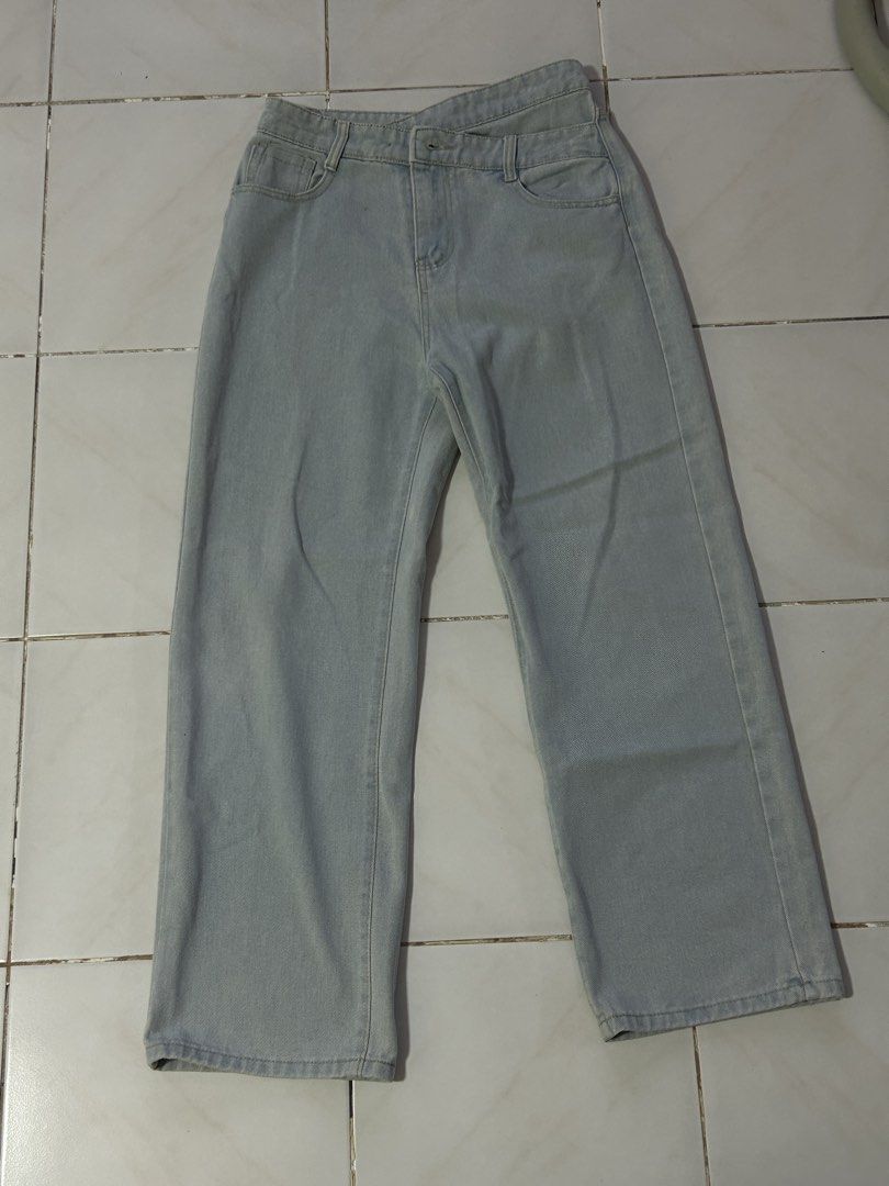 Light Wash Asymmetrical Jeans (Category: Jeans) located in Manila. Submitted by viyyu (Listing ID 1470416183, Image 1). Description: •Loose straight-leg denim jeans •asymmetric crossover design •Light wash with no heavy fading •Button fly, zip closure, and back pockets.