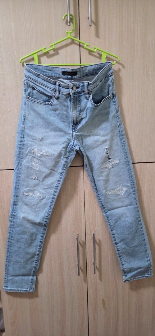 Light wash distressed denim jeans pants (Category: Jeans) located in Manila. Submitted by marco10e (Listing ID 1470413696, Image 1). Description: - Color: Light wash blue - Style: Cropped length ankle cut with distressed details and ripped knees - Design: Classic styling with belt loops - Closure: Button fly - Feel: Soft faded wash throughout.