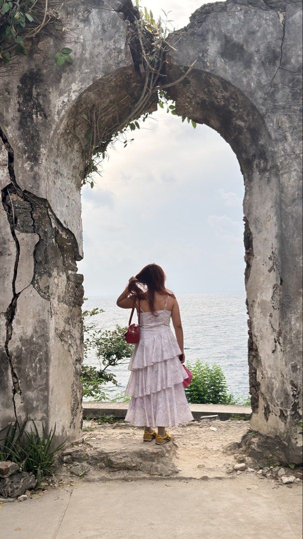 Lilac Checkered Spaghetti Strap Tiered Maxi Dress (Category: Dresses) located in Antipolo. Submitted by kngtmy (Listing ID 1470406863, Image 3). Description: - Color: Lilac - Style: Spaghetti strap maxi dress with flowing silhouette - Details: Checkered texture all over, tiered ruffled skirt with embroidered butterflies, shell and bead neckline trim - Straps: Thin and adjustable - Condition: Worn once for a photoshoot, properly stored - Best for: