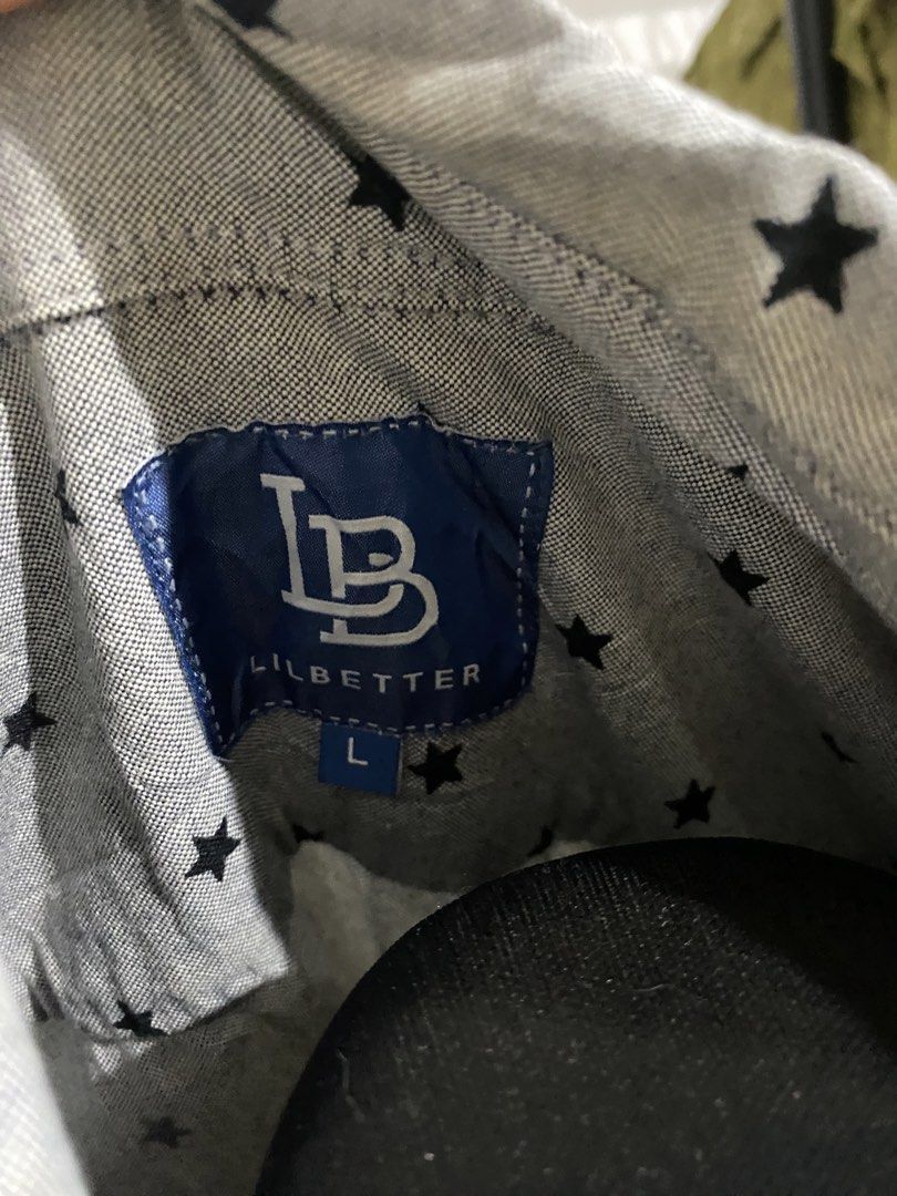 Lilbetter Gray Star Print Button Down Shirt (Category: Formal Shirts) located in Manila. Submitted by mpt99876 (Listing ID 1470497515, Image 3). Description: - Brand: Lilbetter - Color: Gray with all-over black star pattern - Style: Long sleeve button-down with classic collar - Size: L - Condition: Great piece for casual wear.