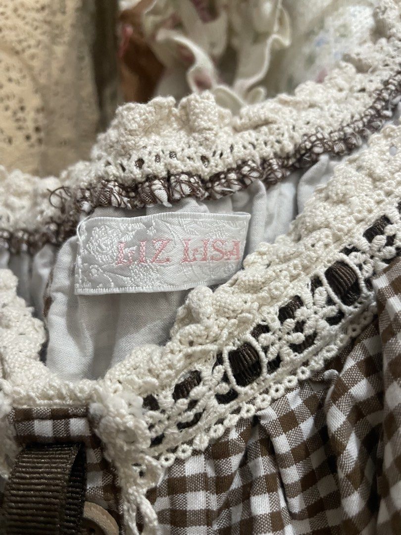 LIZ LISA brown gingham dress (Category: Dresses) located in Paranaque City. Submitted by lalluviashop (Listing ID 1470462329, Image 3). Description: Size is free size With brand tag and washtag Ww on last slide Gcash/Gotyme payment Jnt delivery .