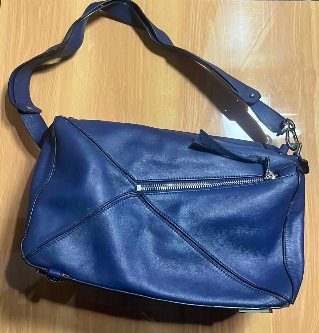 Loewe Puzzle Geometric Shoulder Bag (Category: Luxury Bags & Wallets) located in Manila. Submitted by senggggg. (Listing ID 1470524760, Image 3). Description: verrygood condition working zip minimal sign of use need minimal cleaning check detail and size.