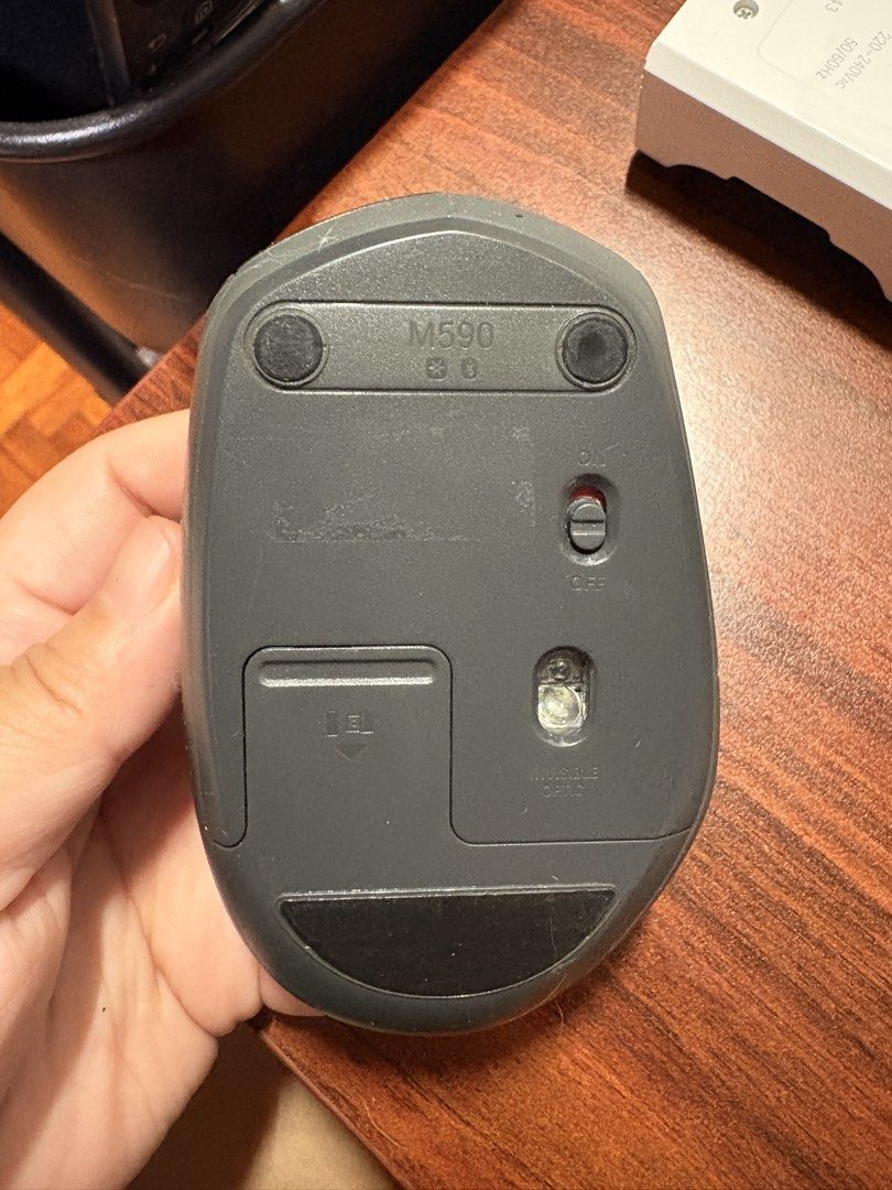 Logitech M590 Wireless Mouse (Category: Mouse & Mousepads) located in Manila. Submitted by karellevic16181 (Listing ID 1470465611, Image 2). Description: - Model: Logitech M590 Silent Wireless Mouse - Color: Dark Grey - Lightly used, only during overseas business trips - Condition: Light wear and tear on rubber part of mouse RFS extra, pandemic buy.