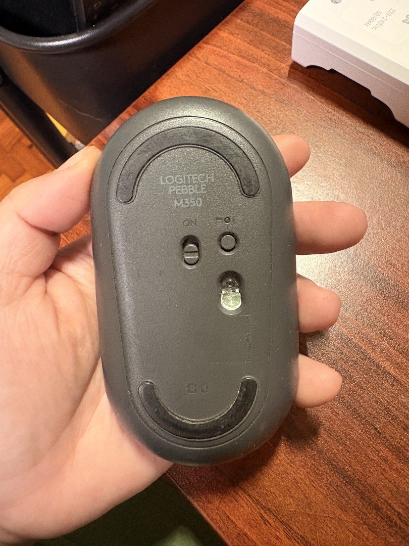Logitech Pebble M350 Wireless Mouse Dark Gray (Category: Mouse & Mousepads) located in Manila. Submitted by karellevic16181 (Listing ID 1470465010, Image 2). Description: - Logitech Pebble M350 Wireless Mouse - Color: Dark Gray - Connectivity: Bluetooth pairing with a convenient button on the bottom - Moderately used on WFO days - Performance: Smooth scroll wheel and reliable optical sensor that works on most flat surfaces RFS extra, pandemic spl