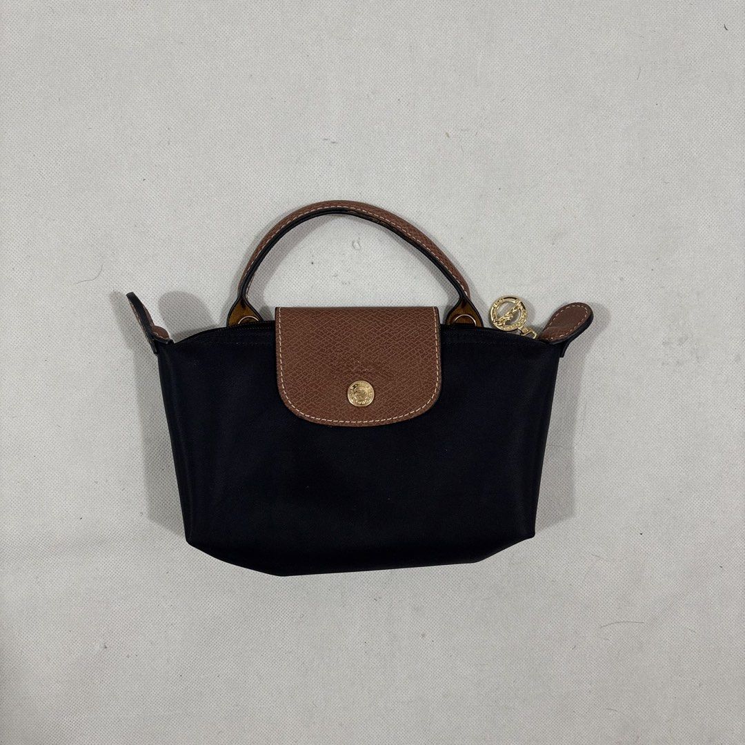 Longchamp Pouch Sling Shoulder Bag w Handle (Category: Sling Bags) located in Cavite. Submitted by itsayaaa (Listing ID 1470542252, Image 2). Description: No issue Excellent Condition .