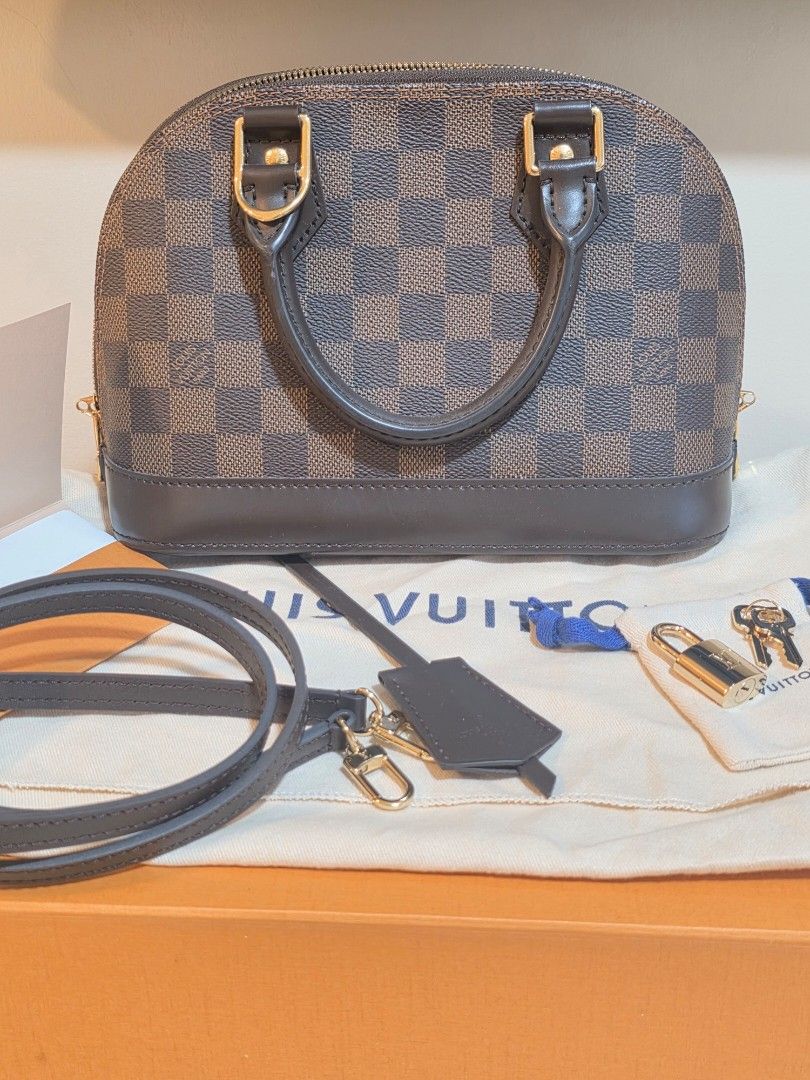 Louis Vuitton Alma BB Damier Ebene | Authentic | Lightly Used (Category: Luxury Bags & Wallets) located in Pasig City. Submitted by theprelovededitbyk (Listing ID 1470450033, Image 1). Description: Louis Vuitton Alma BB | Damier Ebene 🤎 Lightly used and well-maintained, with minimal signs of use. Personally purchased from a Louis Vuitton boutique. Comes with original accessories, dust bag, and inclusions as shown in photos. RFS: Closet declutter