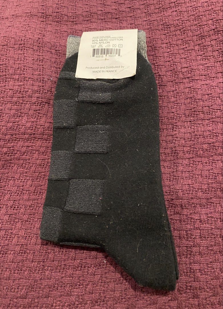 Louis Vuitton Damier Pattern Socks Black Grey (Category: Socks) located in Muntinlupa City. Submitted by mj.finds (Listing ID 1470491095, Image 2). Description: - Louis Vuitton crew socks - Classic black and grey checkered Damier pattern - Features embroidered LV logo on the side - Premium blend of 90% mercerized cotton and 10% nylon - Made in France - Brand new, unworn with paper tag attached.