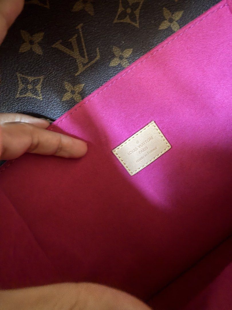 Louis Vuitton Monogram Canvas Sticker Pochette Metis Bag (Category: Luxury Bags & Wallets) located in Davao. Submitted by bribab (Listing ID 1470361247, Image 3). Description: - Brand: Louis Vuitton - Material: Classic brown monogram canvas with colorful lock and key patches - Interior: Bright pink lining with code tag DU4178 - Hardware: Gold-tone with front clasp closure - Inclusion: Top handle, adjustable shoulder strap (still in plastic wrap),