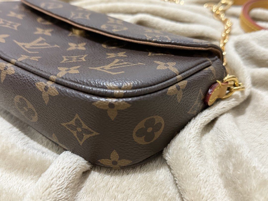 Louis Vuitton Monogram Canvas Crossbody Bag (Category: Luxury Bags & Wallets) located in Manila. Submitted by declutterwtmaan (Listing ID 1470452747, Image 2). Description: - Louis Vuitton Monogram Canvas Crossbody Bag - Features rich dark brown leather trim and gleaming gold hardware - Secure flap closure with a convenient magnetic snap button - Includes 2 versatile straps: a chunky gold chain strap and an adjustable leather strap - Clean brown 