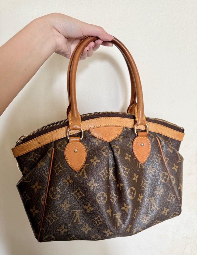 Louis Vuitton Monogram Canvas Handbag (Category: Luxury Bags & Wallets) located in Cebu City. Submitted by uniquepreloved88 (Listing ID 1470477265, Image 2). Description: - Authentic classic monogram canvas with durable vachetta leather trim and handles - Secure zip-top closure with a stylish zipper charm on the side - Gleaming gold-tone hardware throughout - Spacious interior lined to fit all your daily essentials - NOT sure if A UTH - Condition