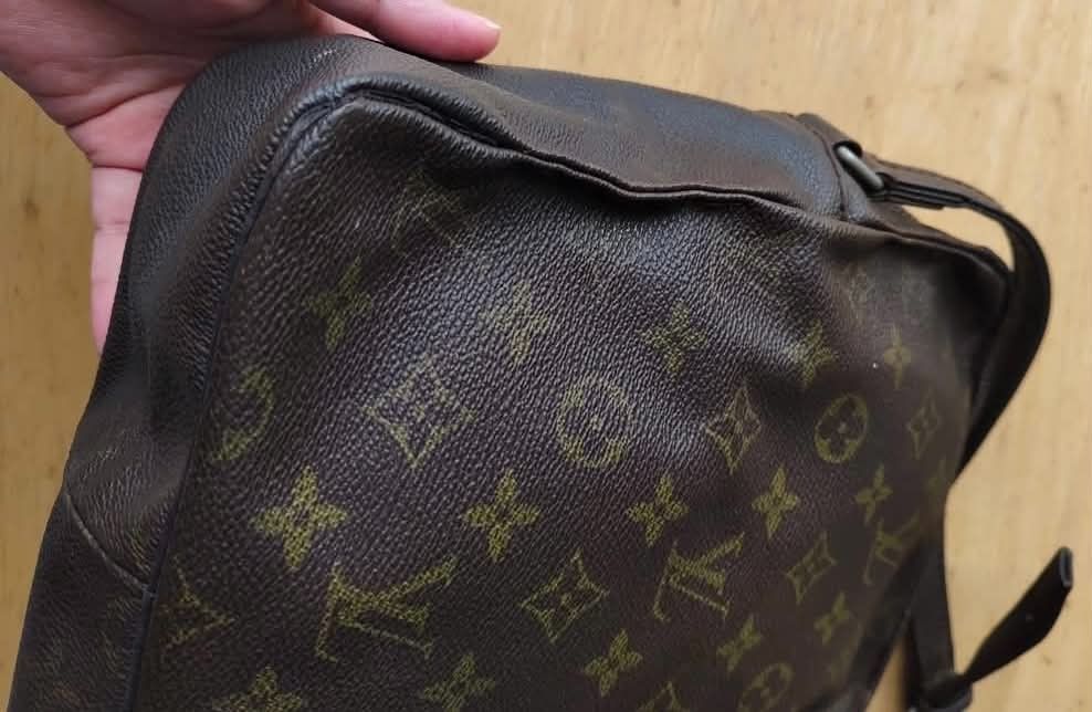 Louis Vuitton Monogram Messenger Crossbody Bag (Category: Luxury Bags & Wallets) located in Manila. Submitted by gutierrez23265 (Listing ID 1470414778, Image 3). Description: - Brand: Louis Vuitton -PROJECT BAG - Design: Classic brown monogram canvas with dark brown trim - Closure: Secure top zip closure - Strap: Adjustable shoulder strap with metallic hardware - Interior: Fabric-lined with convenient slip pocket compartments - Condition: Excelle
