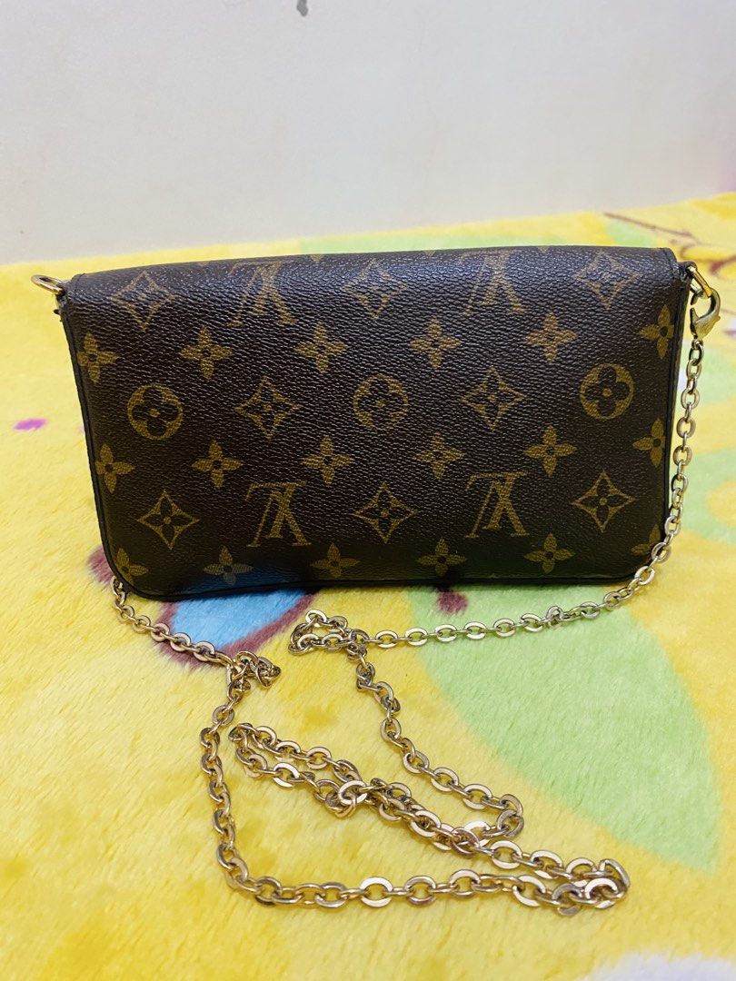 Louis Vuitton Monogram Owl Animation Chain Wallet Bag (Category: Luxury Bags & Wallets) located in San Jose del Monte. Submitted by cityhanter007 (Listing ID 1470515233, Image 2). Description: Louis Vuitton monogram canvas chain bag with playful colorful owl appliques on the front flap. Monogram pattern throughout the body. Gold-tone chain strap included. Envelope flap closure with a triangular V hardware piece serving as the owl beak. Compact st