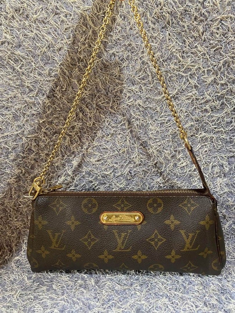 Louis Vuitton Monogram Pochette Accessoires Chain Bag (Category: Luxury Bags & Wallets) located in Midsayap. Submitted by purse_gedo (Listing ID 1470362600, Image 2). Description: - Authentic Louis Vuitton Monogram canvas pochette - Features gold-tone hardware and LV engraved front plaque - Includes a detachable chain strap and secure top zip closure - Brown textile interior lining with date code stamp DU0159 - Condition: Canvas body is intact, b