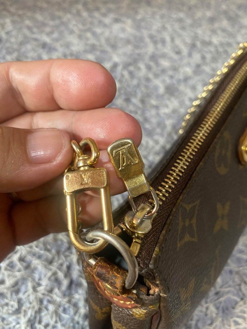 Louis Vuitton Monogram Pochette Accessoires Chain Bag (Category: Luxury Bags & Wallets) located in Midsayap. Submitted by purse_gedo (Listing ID 1470362600, Image 3). Description: - Authentic Louis Vuitton Monogram canvas pochette - Features gold-tone hardware and LV engraved front plaque - Includes a detachable chain strap and secure top zip closure - Brown textile interior lining with date code stamp DU0159 - Condition: Canvas body is intact, b
