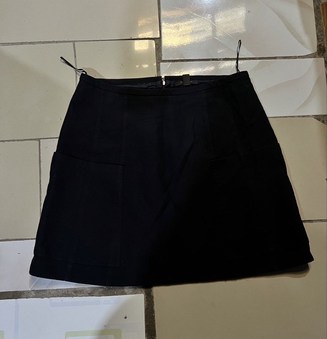 Louis Vuitton Skirt (Category: Skirts) located in Iloilo. Submitted by deric.john93 (Listing ID 1470374630, Image 1). Description: size 40 on tag no flaws with 2 pockets like new condition 9.8/10 color rate Authentic/Legit details posted 2000 iloilo city location .