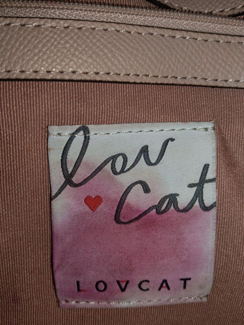 LOVCAT Crossbody Bag — Blush Pink (Category: Shoulder Bags) located in Cagayan de Oro. Submitted by warmbird-f84aab (Listing ID 1470427240, Image 2). Description: Condition: 9/10 — Well-loved, minimal signs of use ✅ No major flaws, clean inside & out Color: Blush nude / soft pink with gold hardware Material: Saffiano leather — durable & easy to clean Features: ✅ Detachable chain + leather strap — wear as crossbody, shoulder bag, or clutch ✅ Twist