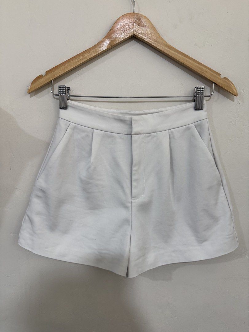 Love Bonito Off White Shorts (Category: Shorts) located in Manila. Submitted by morningthrifters (Listing ID 1470478116, Image 1). Description: 📝Love, Bonito off white tailored high-waisted shorts, featuring an A-line silhouette, structured front pleats, slant side pockets, and a clean front fly closure. 📐 Size 25-26 💗 Second time buyers has a free item, follow me to get updated. ⚠️ Please make sure you want this item before purchasing, Feel f