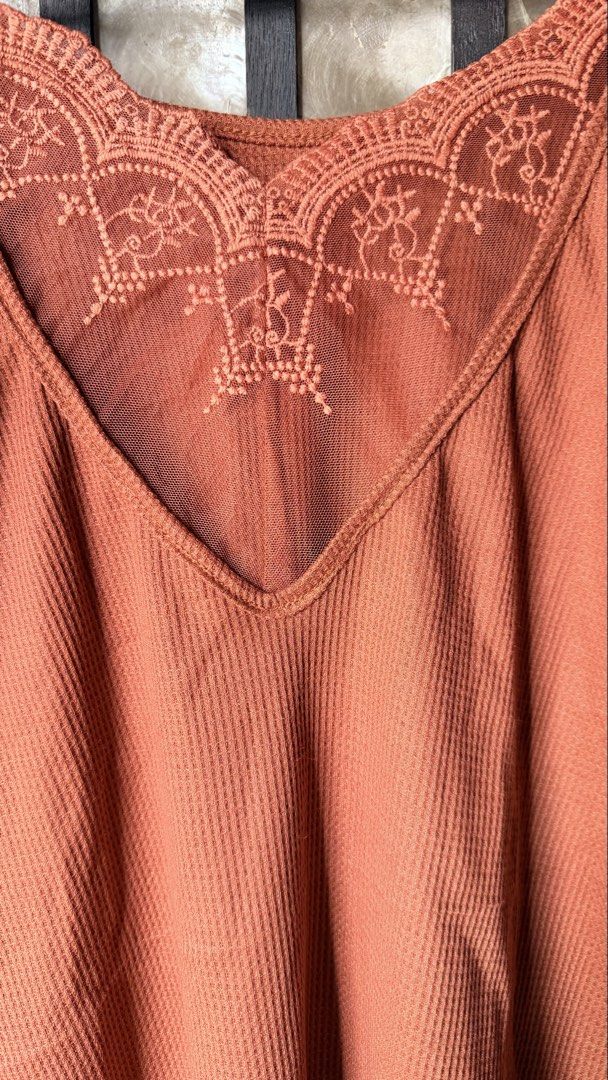 Lovito Rust Orange Long Sleeve Waffle Knit Top (Category: Longsleeves) located in Makati City. Submitted by rocelli28 (Listing ID 1470453819, Image 2). Description: - Brand: Lovito (Brand New with Tags) - Color: Rust Orange - Size: large to XL - Material: Soft, stretchy waffle knit fabric - Design: Scoop front neckline and deep V-shaped mesh and lace back panel - Fit: stretchy, lightweight, and comfortable.