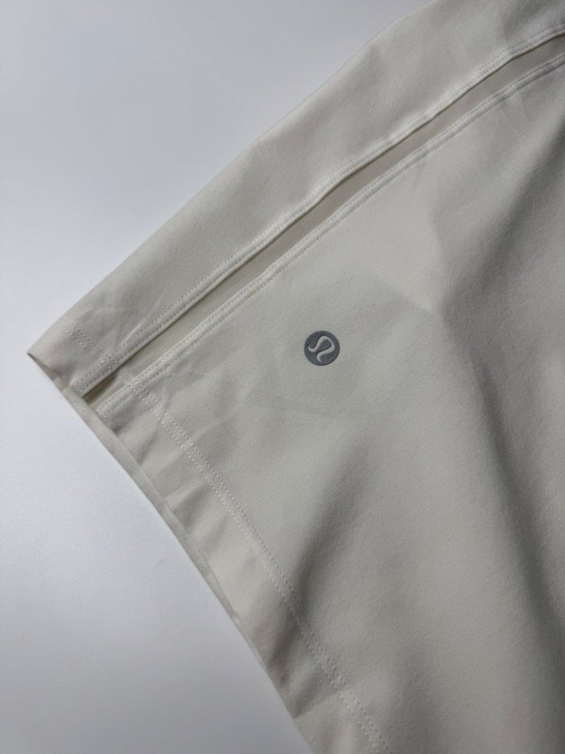 Lululemon ABC Shorts White Athletic Men (Category: Shorts) located in Cavite. Submitted by dracokidstuff (Listing ID 1470374739, Image 3). Description: - Brand: Lululemon - Color: Clean White - Size: 17" across waist (laid flat) - Features: Elastic waistband, adjustable drawstring with branded tips, side pockets, and back zip pocket - Details: Subtle Lululemon logo near the hem - Material: Lightweight performance fabric - Condition: Excellent - B