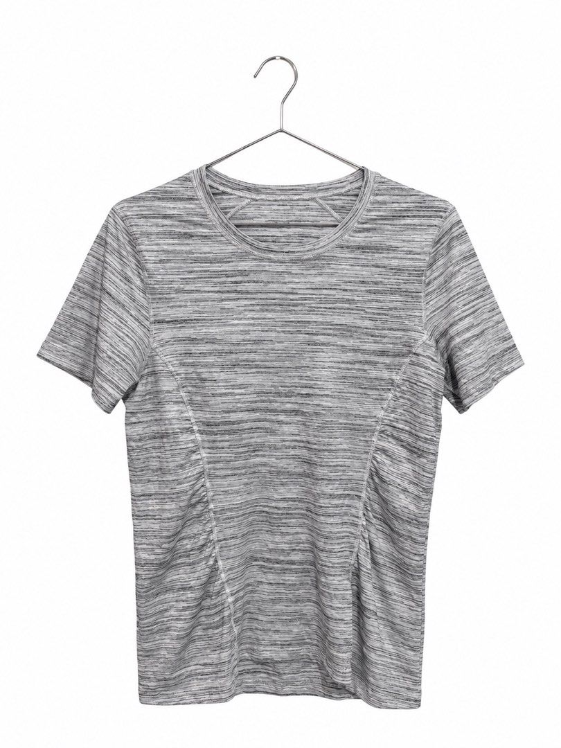 Lululemon Another Mile Short Sleeve (Category: Activewear) located in Caloocan City. Submitted by nlubon (Listing ID 1470458779, Image 1). Description: - Brand: Lululemon - Color/Pattern: Grey space dye - Features: Lightweight and breathable fabric with structured side panel seams - Details: Round neckline with signature reflective omega logo on upper back - Best for: Running, workouts, and casual gym wear.