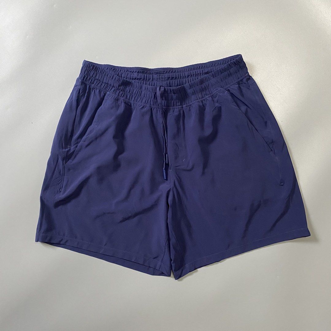 Lululemon Athletic Shorts Navy Blue (Category: Shorts) located in Pagadian. Submitted by 420thriftclothes (Listing ID 1470391717, Image 3). Description: - Brand: Lululemon - Color: Navy Blue - Condition: Clean, excellent overall - Waistband: Elastic with adjustable drawstring - Pockets: Secure zippered side pockets - Details: Reflective logo on the leg - Material: Lightweight and breathable, ideal for workouts and running.