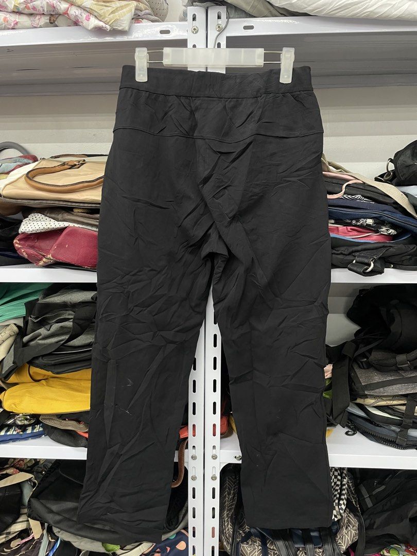Lululemon Black Athletic Pants (Category: Activewear) located in Cebu City. Submitted by lucky.finds.ph (Listing ID 1470371292, Image 2). Description: - Brand: Lululemon - Color: Classic Black - Waistband: Elastic with matching drawcord - Pockets: Deep side pockets + 1 hidden zip pocket - Material: Lightweight and breathable - Details: Signature logo stamped near the hem - Condition: Excellent / Well-maintained - Best for: Gym workouts, running e