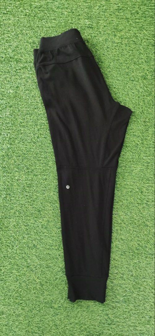 Lululemon Black Joggers Size L (Category: Joggers) located in Makati City. Submitted by rare_thrift_stuff (Listing ID 1470359699, Image 1). Description: - Brand: Lululemon - Item: Athletic Pants - Color: Black - Size: L (Tag attached, brand new) - Material: 87% Nylon, 13% Lycra Elastane - Features: Convenient side slip pockets, iconic logo printed near the right knee - Origin: Designed in Vancouver, made in the Philippines.